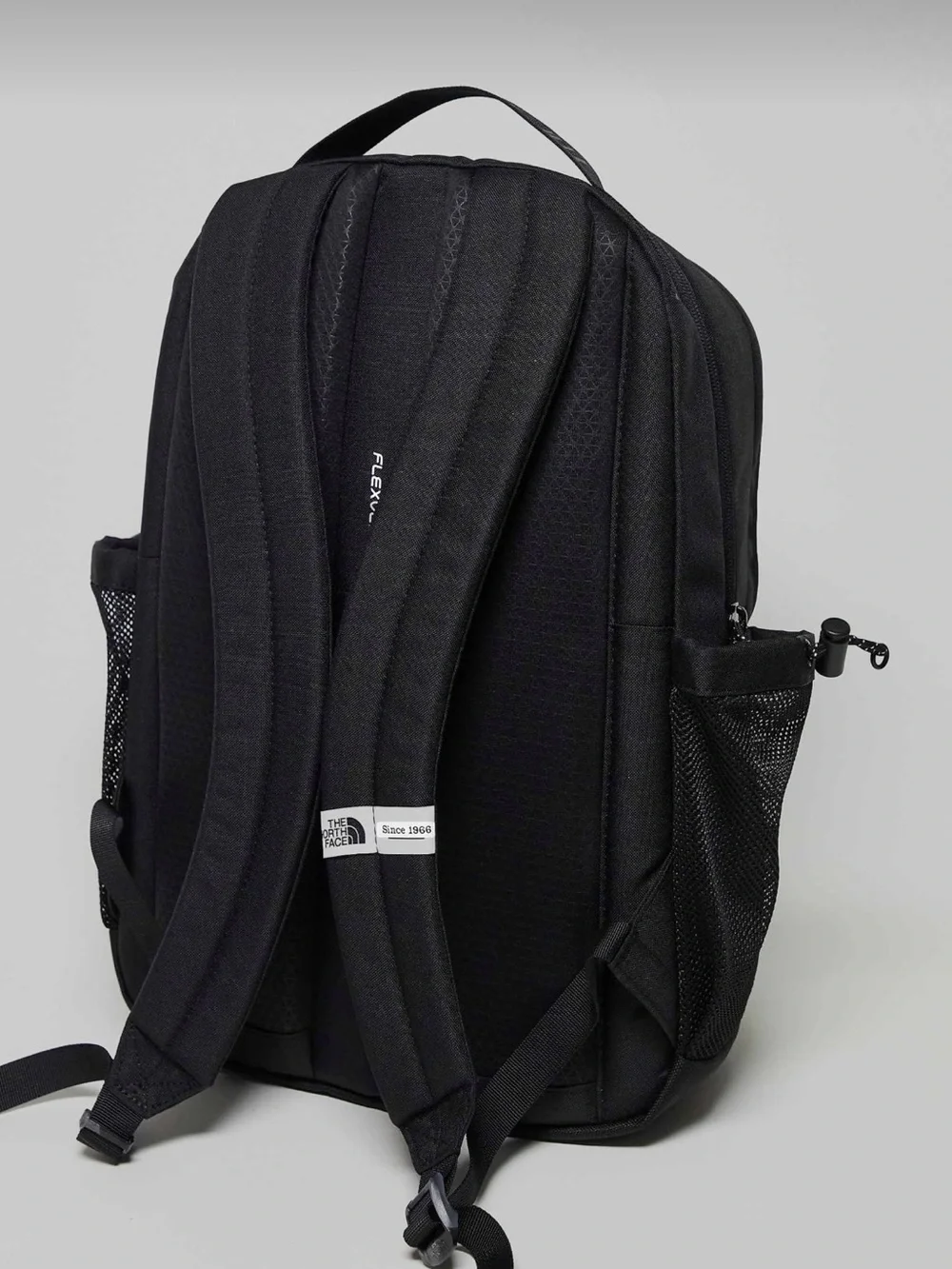 The North Face Bozer III backpack in black/green